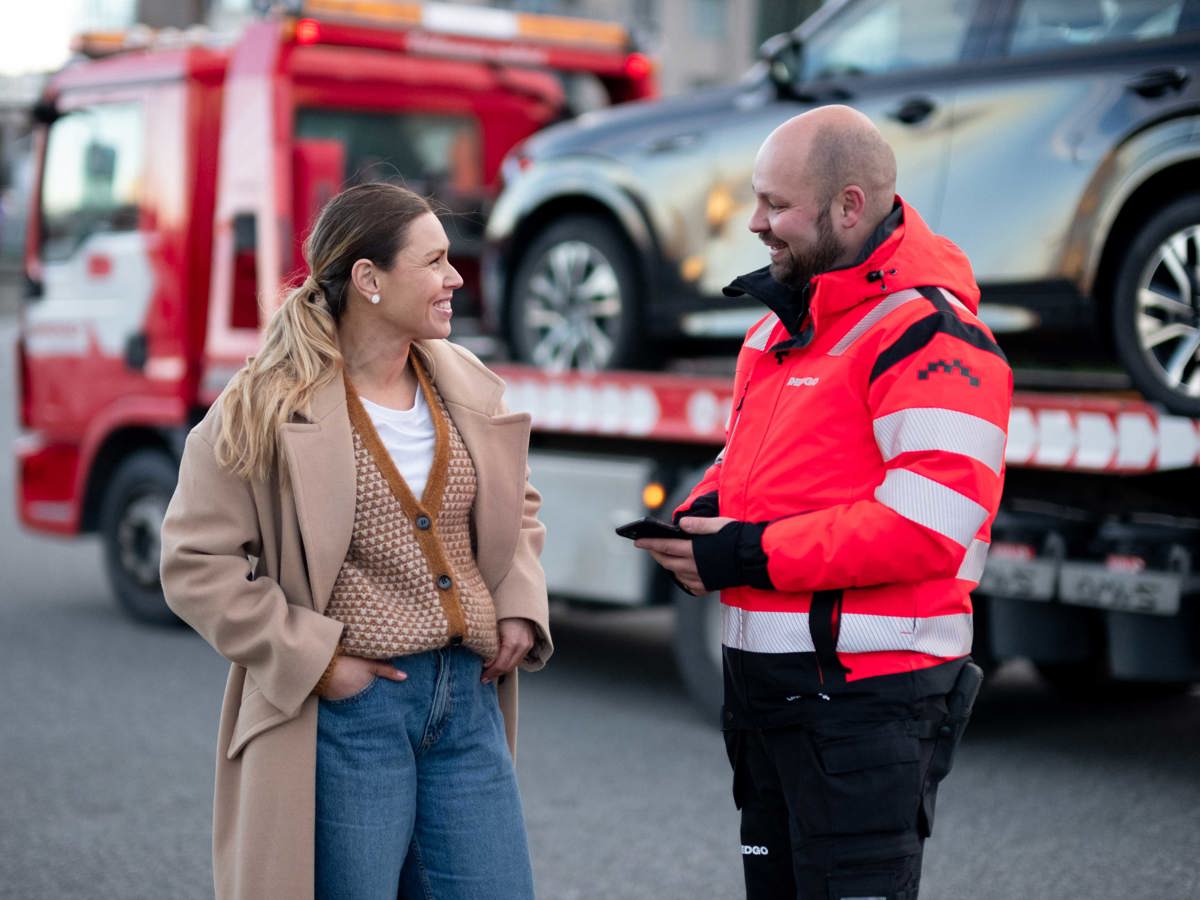 RedGo employee talking to customer.