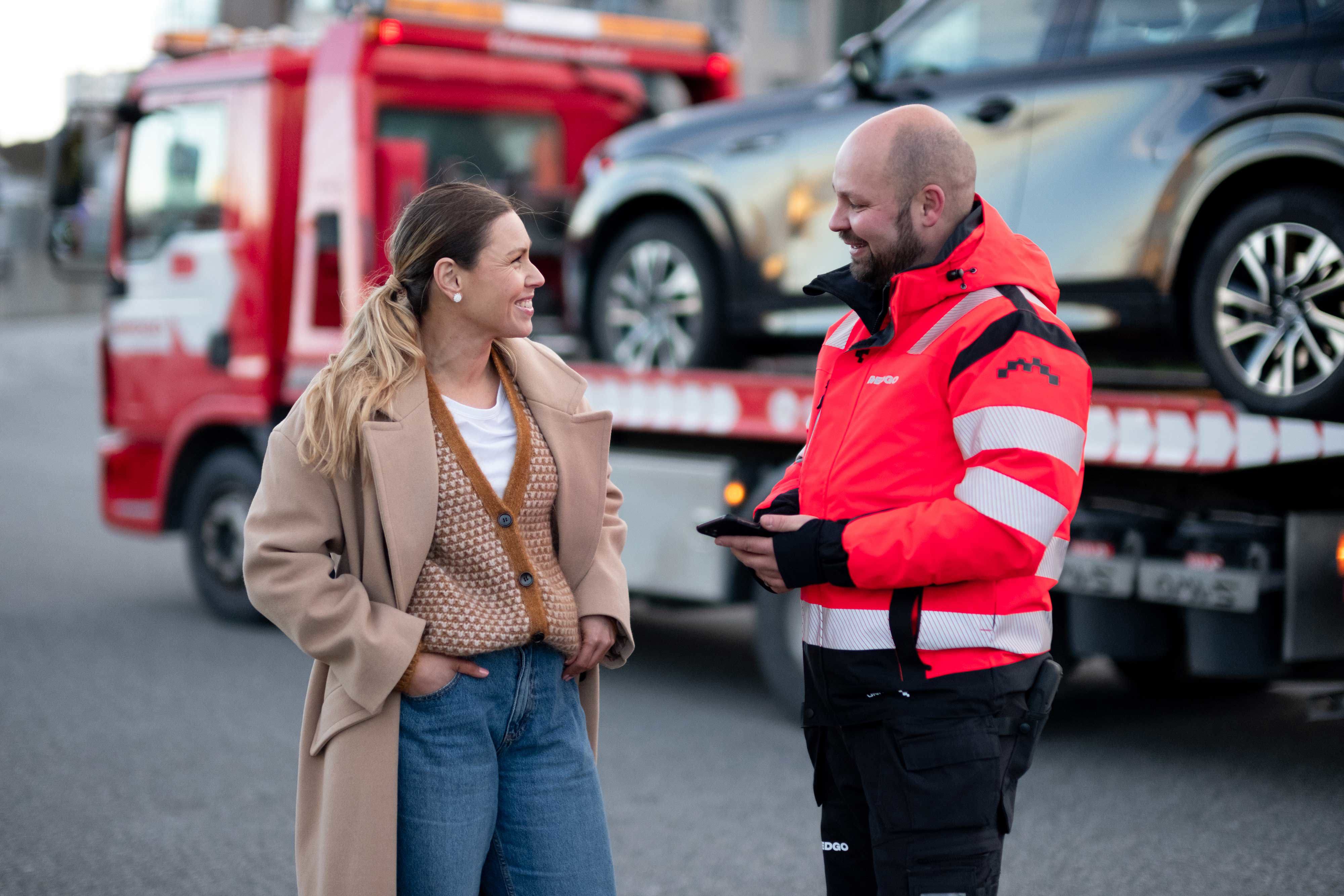 RedGo employee talking to customer.