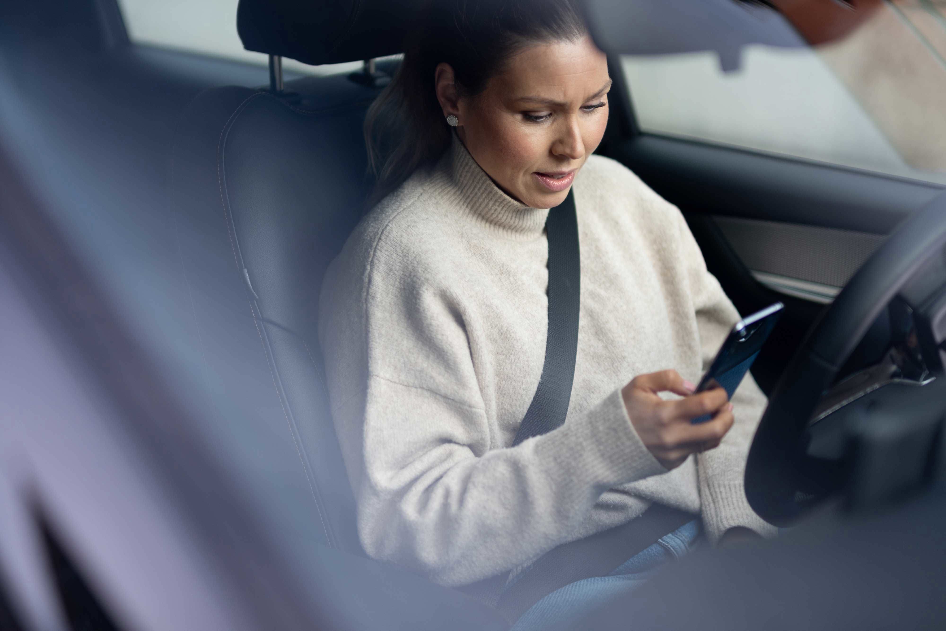 Driver looking at their phone.