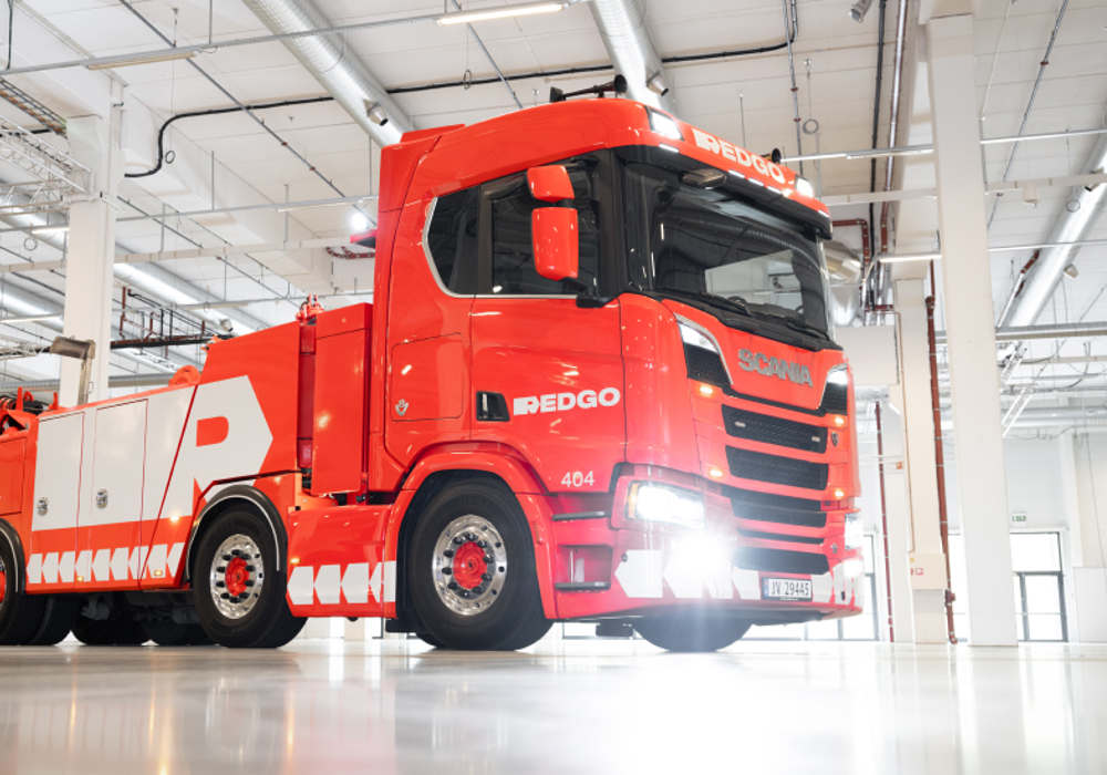 REDGO towing truck in a garage